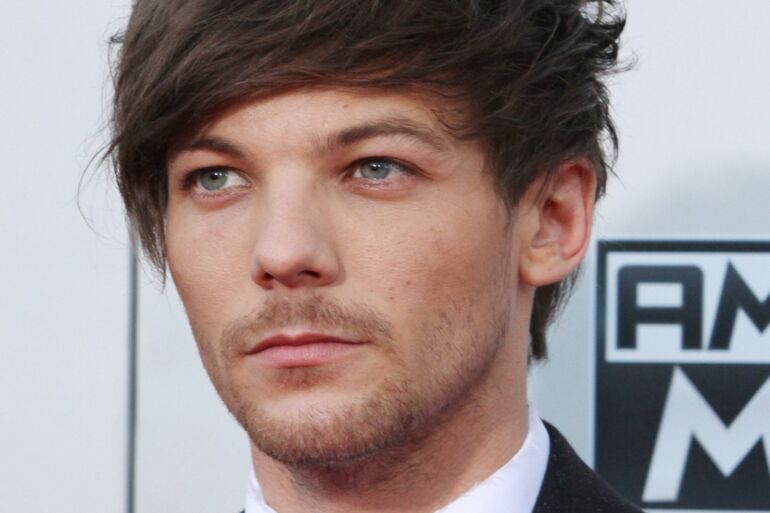 Dėl „One Direction“ nario Louiso Tomlinsono nuotraukos pasaulis eina iš proto (FOTO)