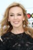 Kylie Minogue jaunatviškumas dingo kaip į vandenį (FOTO)