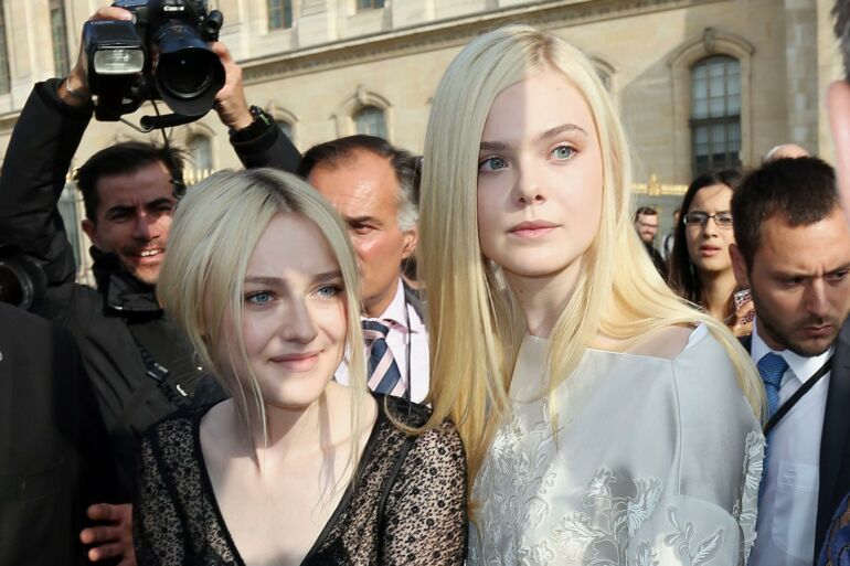 Stiliaus dvikova: seserys Elle ir Dakota Fanning. Kuri stilingesnė?(FOTO)