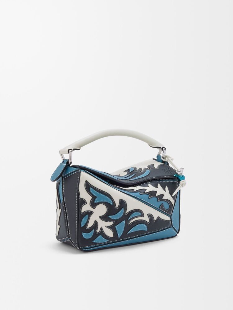 Loewe rankinė puzzle